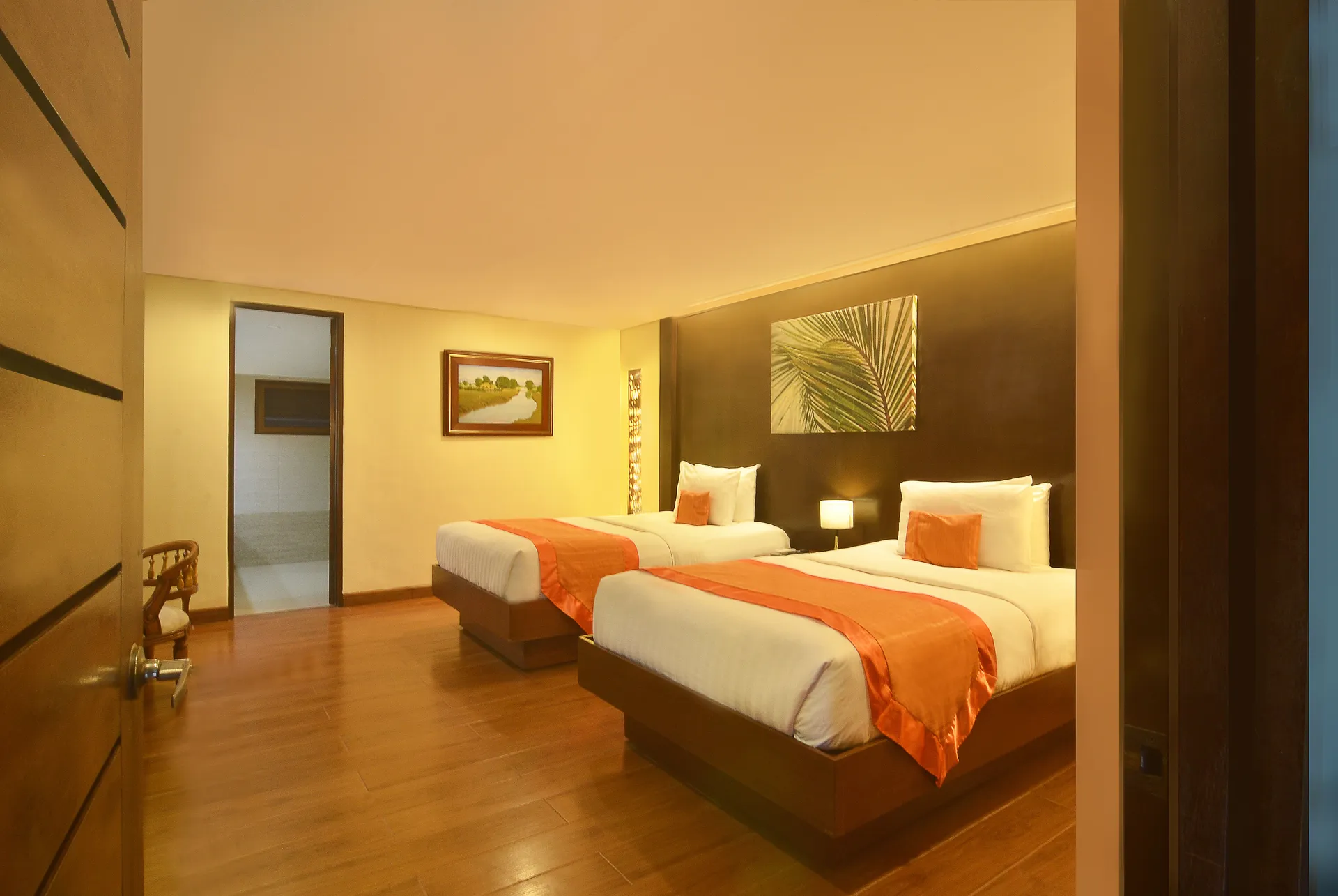 The Gardens, a room set among tropical planting.